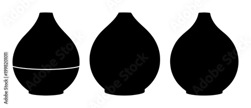 Aromatherapy oil diffuser set with solid black icon on white background featuring aromatherapy, oil, diffuser with wellness and relaxation