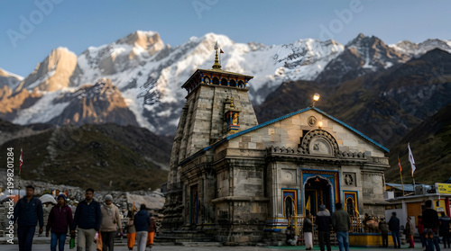 Kedarnath Temple in Himalayas, Sacred Hindu Pilgrimage Site with Snow-Capped Mountains, Ancient Architecture & Devotees.