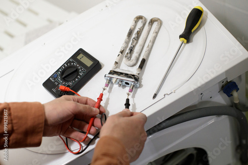 Diagnosing burnt washing machine heating element with scale