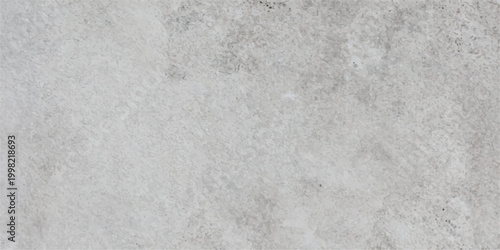 A textured expanse of weathered concrete, revealing a complex dance of light and shadow, capturing the essence of urban decay. 