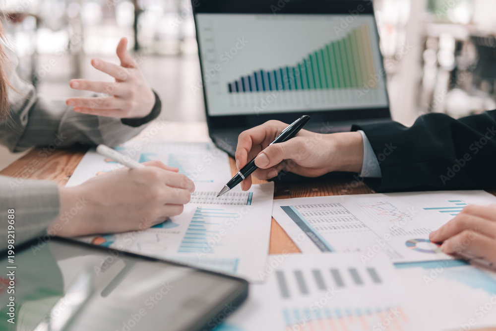 Naklejka premium Analyzing financial data trends office space business meeting collaborative environment aerial view data insights