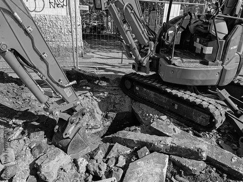 Rome, Italy - October 11, 2025, detail of an earthmoving machine for road and urban redevelopment work, built with a Bobcat.