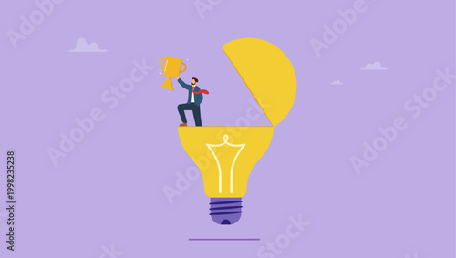 Success businessman leader holding trophy in a big lightbulb idea. Startup and business success concept.