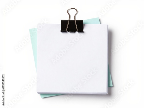 Blank paper stack with binder clip on white background