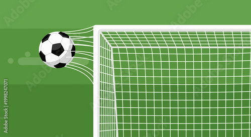 Soccer ball kicks into football goal on green field with net