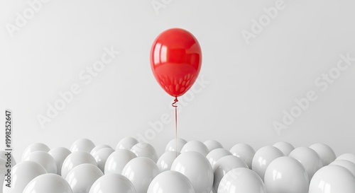 A solitary red balloon floats above a sea of white balloons, creating a striking contrast against the backdrop of a white wall.