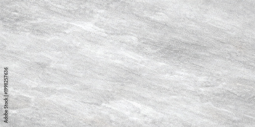 Gray marble texture background: natural stone surface with soft flowing veins, subtle cloudy pattern and smooth polished elegant neutral backdrop
