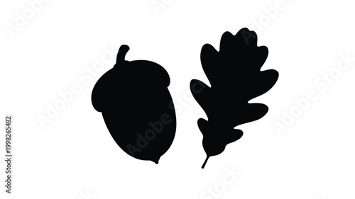 Black silhouettes of an acorn and oak leaf against a white background silhouette