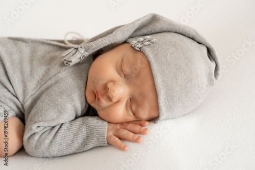 portrait of a sleeping newborn baby, space for text, a little baby sleeping peacefully