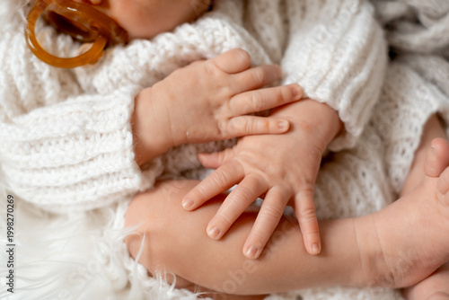 arms and legs of a newborn baby