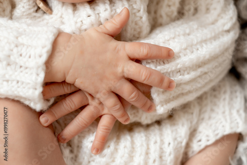 newborn baby's hands close-up