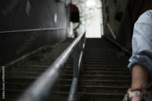 young man walking on the stairs