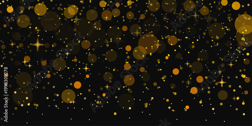 Golden bokeh light particles and stars on black background festive holiday texture.
