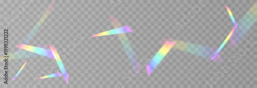 Falling holographic confetti. Shiny rainbow confetti PNG. Falling streamers or tinsel on an isolated transparent background.