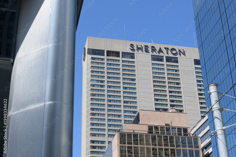 Fototapeta premium Sheraton Centre hotel sign on south-facing elevation of 123 Queen St W, Toronto