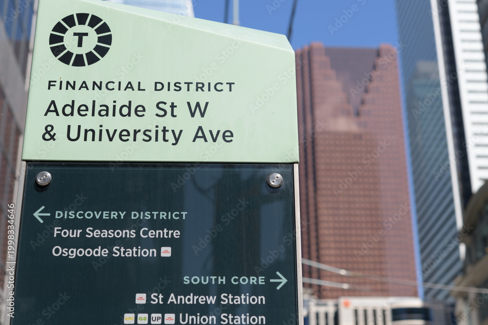 Obraz premium location marker in the Toronto Financial District at Adelaide St W and University Ave with defocused view of Scotia Plaza