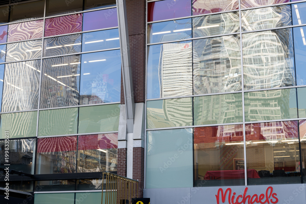Obraz premium exterior of RioCan Hall with sign of Michaels, a craft store chain, located at 142 John St, Toronto
