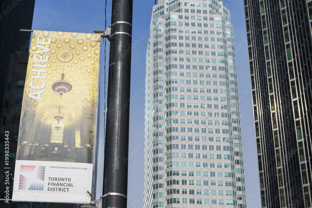 Fototapeta premium Toronto Financial District barrier with defocused view of Brookfield Place, 181 Bay St - looking east on Wellington St W, Toronto