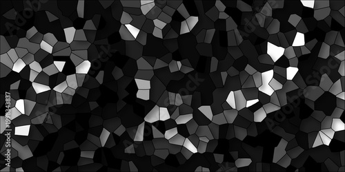 Abstract geometric mosaic pattern with irregular polygons in grayscale tones creating a textured background effect