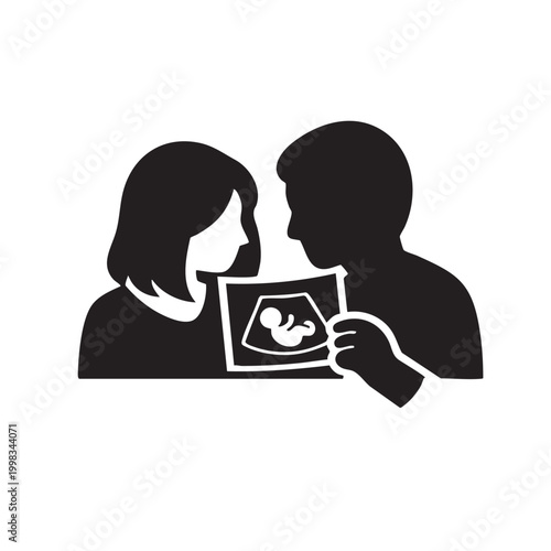 A couple looking at an ultrasound scan of the baby's silhouette