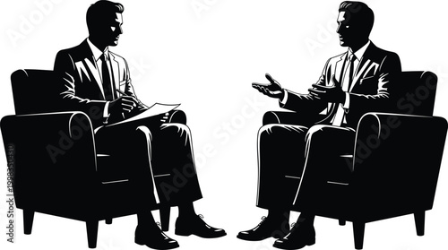 Professional business interview silhouette of two businessmen in formal suits sitting in armchairs having a serious discussion with one man taking notes on paper