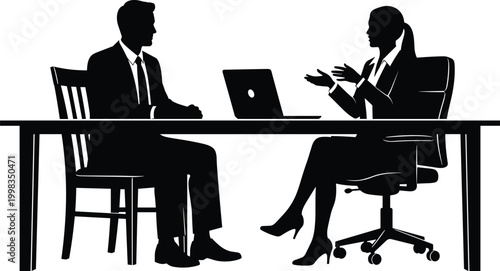 Professional business meeting silhouette of a businessman and businesswoman in formal suits discussing corporate strategy over a laptop at an office desk