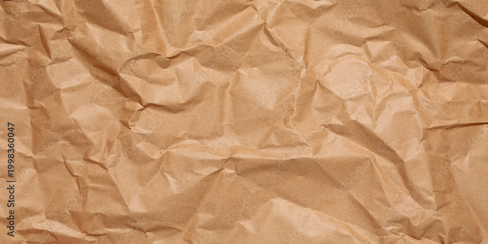 Obraz premium crumpled brown paper background,Crumpled Paper Poster Photo Effect Mockup,Crumpled Paper texture overlay effec,crumpled kraft paper background