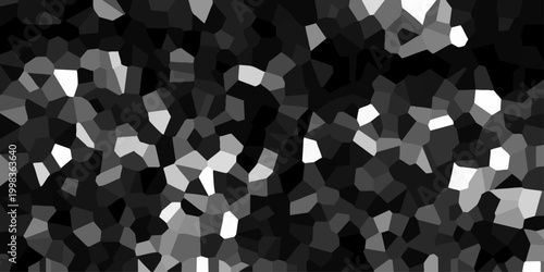 Dynamic black and white mosaic with scattered bright white polygonal fragments against a dark, textured background for abstract design