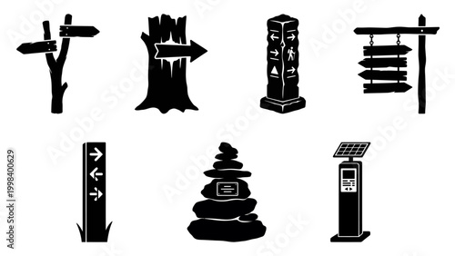 Set of outdoor wayfinding silhouettes rustic posts, cairns, and solar signs