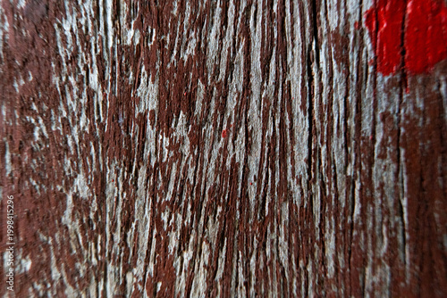 Weathered Brown Wood Texture with Red Paint Splatter