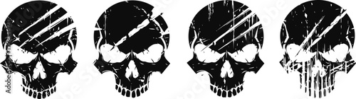 set of four black grunge skulls with various distressed and scratched textures