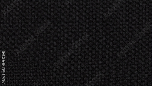 Black textured fabric close up woven material background