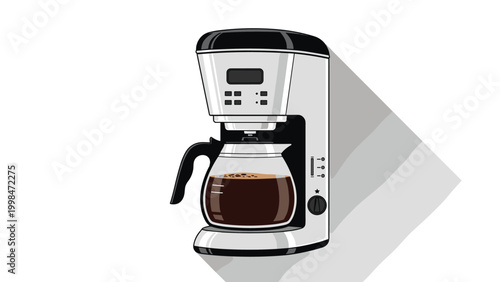 Silver and black drip coffee maker with a glass carafe filled with freshly brewed dark coffee against a simple white background.