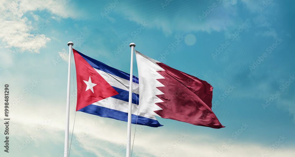 Fototapeta premium Cuba and Qatar friendship flags are waving in the sky. Two country flag for agreement or deal. Cuba Qatar national flag for commitment.