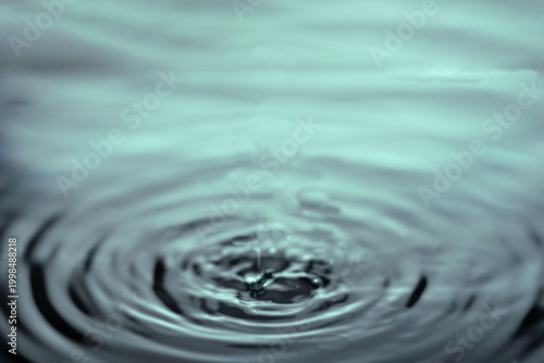 273.Bluish Water Ripples from Droplet Impact Close-Up