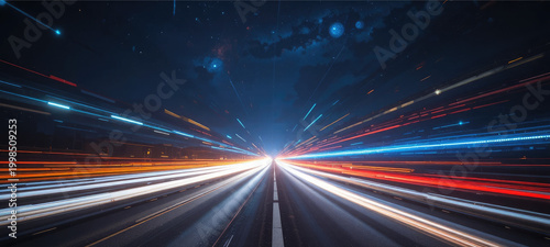 Fast moving traffic on a highway at night with blurred lights and urban road perspective