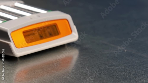 Charger for charging 4 AA rechargeable batteries. 