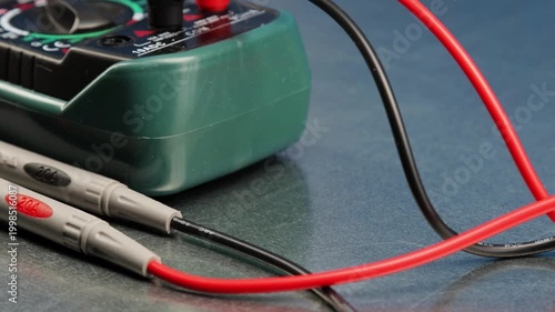 A digital multimeter for measuring the parameters of electrical circuits. Close-up. Soft focus.
