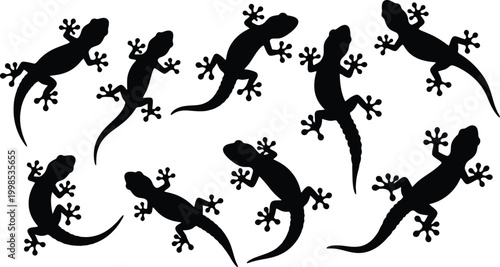 Several black lizard silhouettes displayed in different crawling poses for various creative design and vector projects