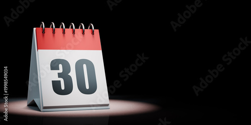 Fotografie Calendar Spotlighted on Black Background, Day 30