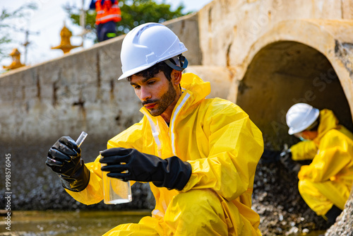 Hazmat Worker Testing Water Sample for Chemical Contamination