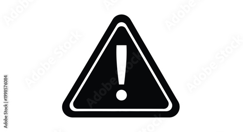 Black triangular warning sign with exclamation point a stark silhouette