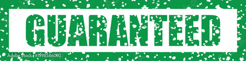 Green guaranteed text stamp on a white background
