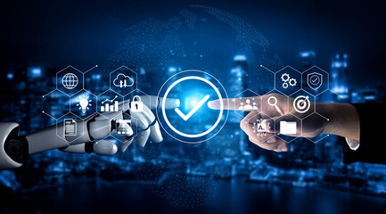 A futuristic scene depicting a human hand and a robot hand reaching towards each other, surrounded by digital icons representing technology and connectivity in an urban setting. Gantry