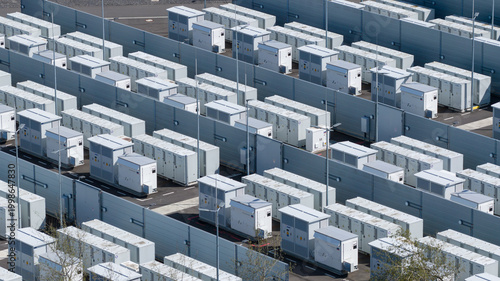 Hamm, Germany - 6 April 2026: Aerial view of the RWE Westfalen power plant battery storage facility with rows of white containers and grey partition walls.