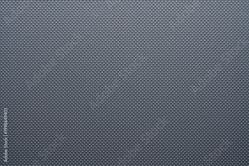 Foto Grey perforated texture background with dotted pattern