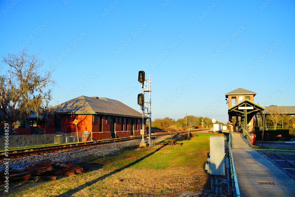 Fototapeta premium Plant City, Florida, USA: 03 20 2026: Landscape of plant city downtown and historic train station, Florida