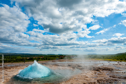Quadro su tela Strokkur geyser erupting in Haukadalur geothermal area Iceland with tourists wat