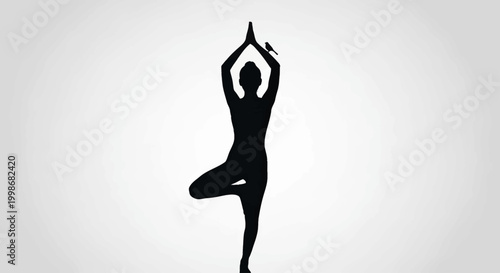 Black silhouette of a person performing a yoga pose with a bird on arm