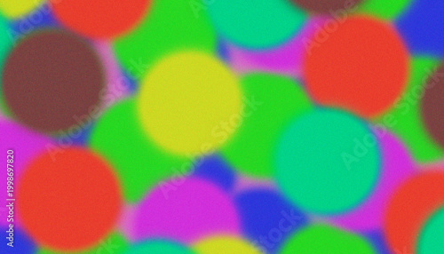 Vibrant, blurred circles in a playful, abstract pattern with a grainy texture